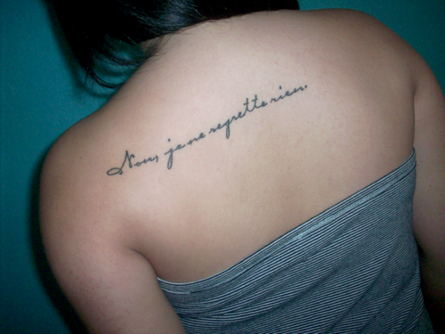 French Tattoo Design On Upper For Girl