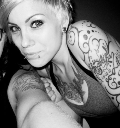 Arm Tattoo and Face Piercing for Girl