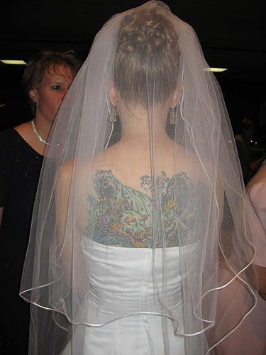 Gorgeous Women Back Tattoo in Wedding Ceremony