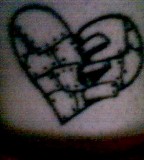 Broken Heart On Inner Ankel Tattoo