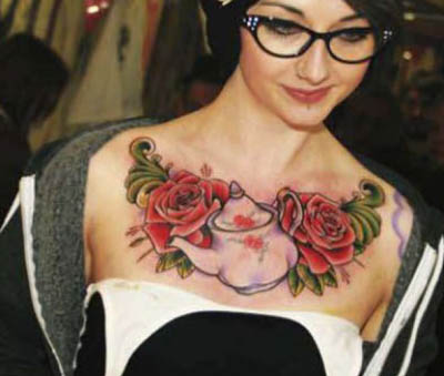 Girl with Wonderful Rose Tattoo Design on Chest