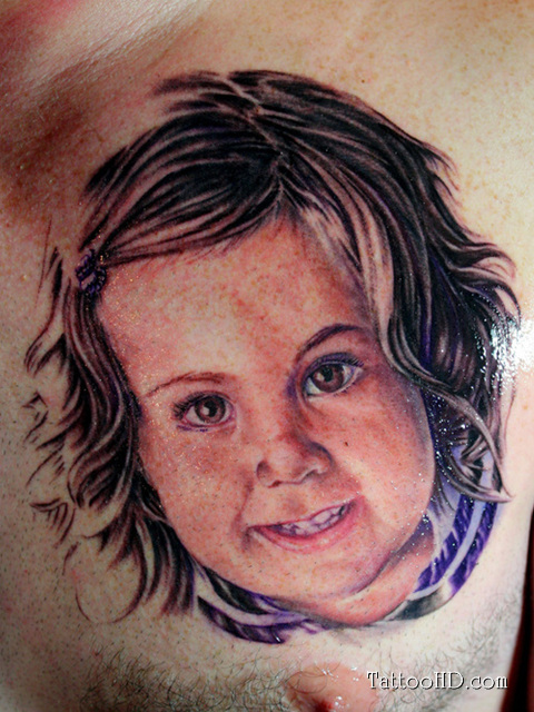 Cute Baby Face Chest Tattoo Designs