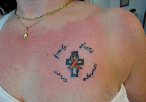 Wonderful Cross Shaped Symbolizing Family Tattoo Design