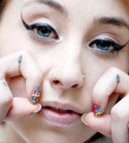 Kreayshawns Tattoos Teardrop Meanings