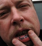 Teardrop And Inside Lip Tattoos For Man