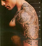 Dwayne Johnson with Cool Tribal Tattoo Design