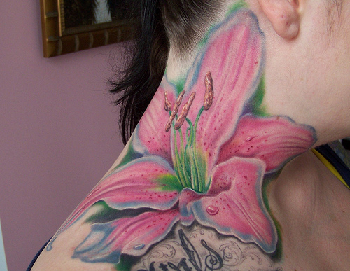 Pink and Green Lilly Tattoo on Right Shoulder