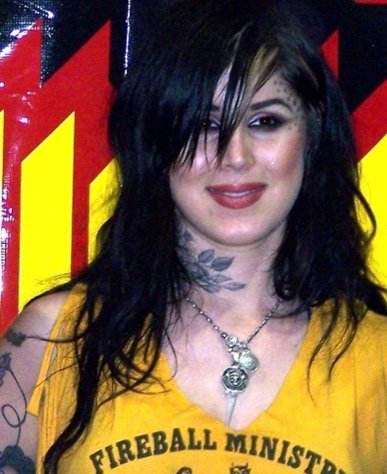 Kat Von D Bold Tattoos on Face, Neck, and Upper Hand