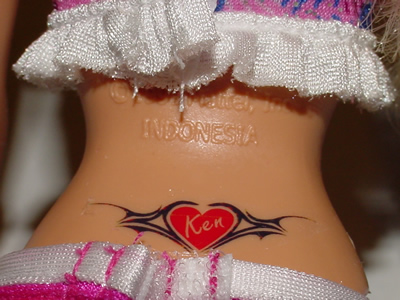 Colored Barbie Tramp Stamp Tattoo Design