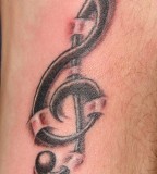 Superb Treble Clef Tattoo Designs