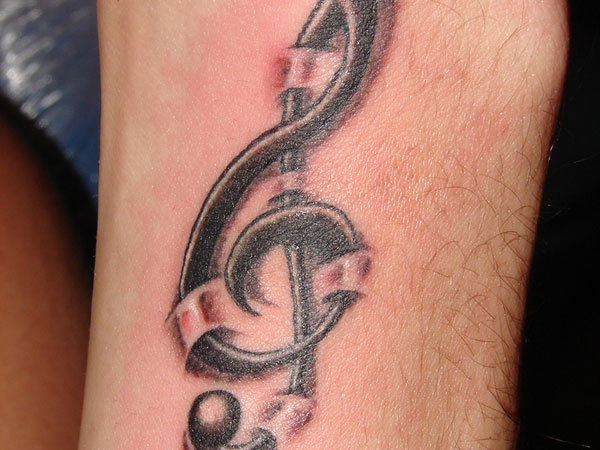 Superb Treble Clef Tattoo Designs