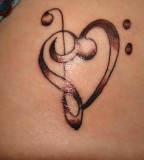 Bass Clef And Treble Clef Tattoo - Upper Back Tattoos