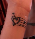 Treble Bass Clef Heart Tattoo With Note At Wrist