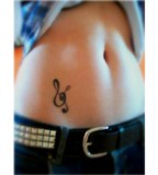 Small and Cute Treble Clef Tattoo for Women