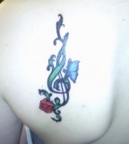 Cute Butterfly and Rose Treble Clef Tattoo