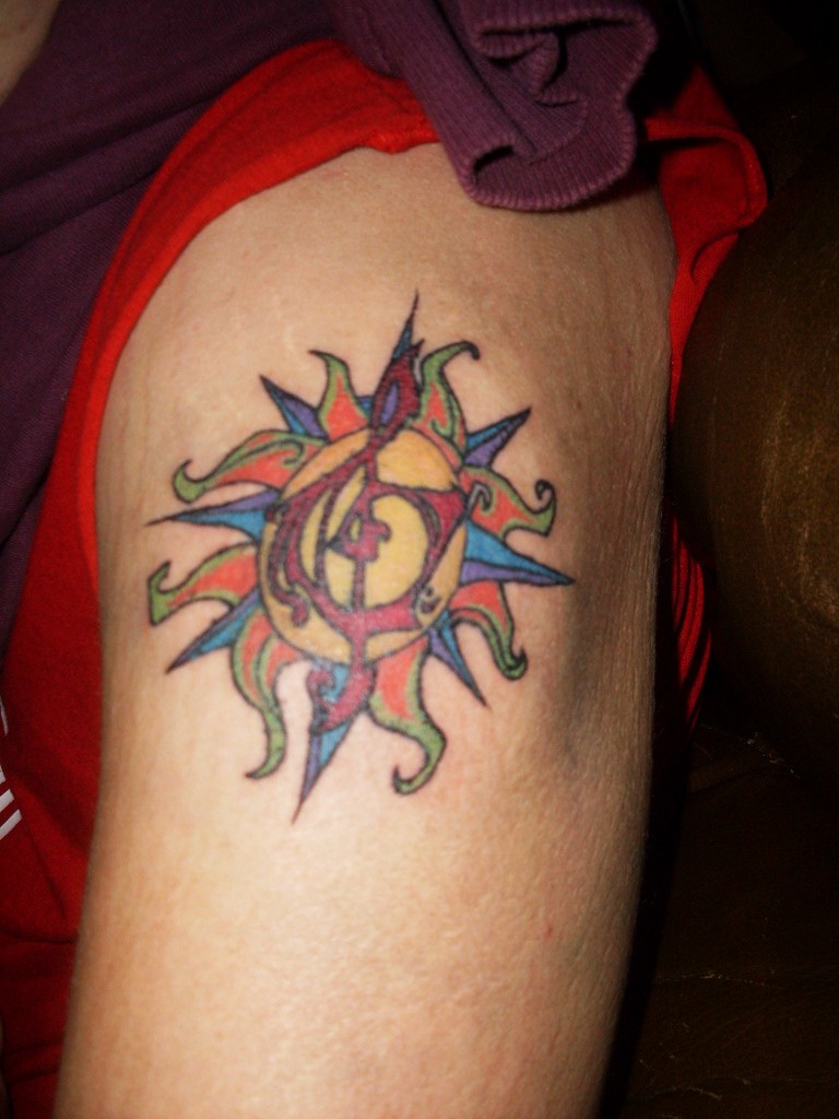 Exotic Sun Treble Clef Tattoo for Men or Women Shoulder