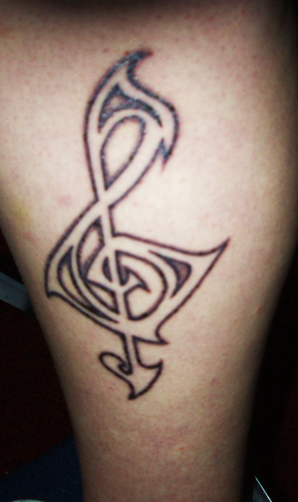 Wonderful Tribal Treble Clef Tattoo Design for Men