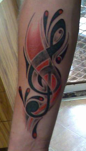 Awesome Treble Clef Music Tattoo Design