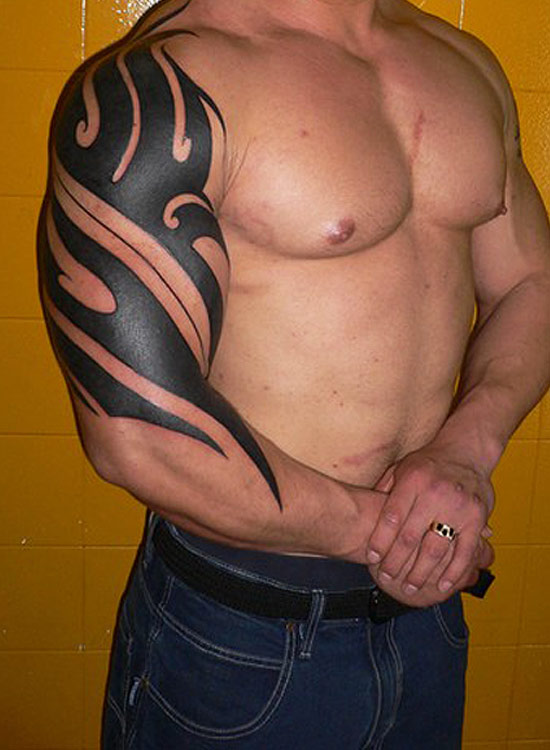 Half-Sleeve Tribal Tattoo Design for Amazing Look Muscle Men