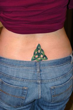 Artistic Lower Back Green Shades Trinity Knot Tattoo Design for Girls