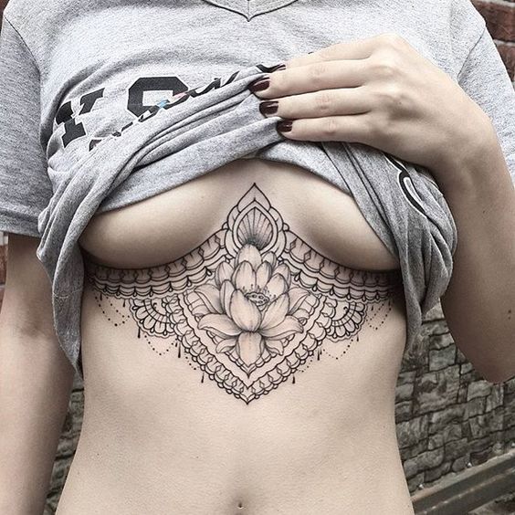 underboob lace and flower tattoo