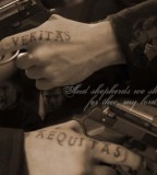 Veritas Aequitas Tattoos on Pointer Finger from The Boondock Saints Movie