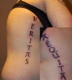 Veritas Aequitas Tattoos on Both Ribs Area, Tattoo Idea for Women (NSFW)