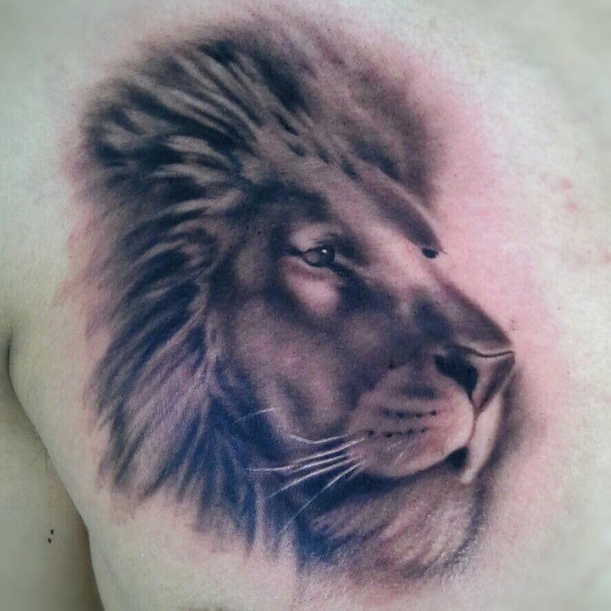 Lion Head Design Tattoo For Men